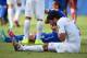 NATAL, BRAZIL - JUNE 24: Luis Suarez of Uruguay and Giorgio Chiellini of Italy react after a clash during the 2014 FIFA World Cup Brazil Group D match between Italy and Uruguay at Estadio das Dunas on June 24, 2014 in Natal, Brazil. (Photo by Matthias Hangst/Getty Images)