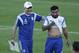 Argentina's head coach Alejandro Sabella, left, pats Ezequiel Lavezzi on the back during a training session in Vespasiano, near Belo Horizonte, Brazil, Monday, June 16, 2014. Argentina plays in group F of the 2014 soccer World Cup. (AP Photo/Victor R. Caivano)