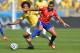 BELO HORIZONTE, BRAZIL - JUNE 28: Alexis Sanchez of Chile and Marcelo of Brazil compete for the ball during the 2014 FIFA World Cup Brazil round of 16 match between Brazil and Chile at Estadio Mineirao on June 28, 2014 in Belo Horizonte, Brazil. (Photo by Buda Mendes/Getty Images)