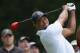BETHESDA, MD - JUNE 27: Tiger Woods of the United States watches his tee shot on the fourt hole during the second round of the Quicken Loans National at Congressional Country Club on June 27, 2014 in Bethesda, Maryland. (Photo by Patrick Smith/Getty Images)
