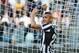 Juventus' Arturo Vidal smiles during a Serie A soccer match between Juventus and Fiorentina at the Juventus stadium, in Turin, Italy, Sunday, March 9, 2014. (AP Photo/Massimo Pinca)