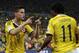 Colombia's James Rodriguez (10) celebrates with his teammate Juan Cuadrado (11) after he scored his side's second goal during the World Cup round of 16 soccer match between Colombia and Uruguay at the Maracana Stadium in Rio de Janeiro, Brazil, Saturday, June 28, 2014. (AP Photo/Marcio Jose Sanchez)