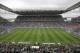 People watch the group D World Cup soccer match between Uruguay and England at the Itaquerao Stadium in Sao Paulo, Brazil, Thursday, June 19, 2014. (AP Photo/Michael Sohn)