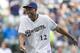 Jabari Parker, of the Milwaukee Bucks, and the number 2 overall pick in the NBA draft throws out the ceremonial first pitch before the start of the Milwaukee Brewers' and Colorado Rockies' baseball game Saturday, June 28, 2014, in Milwaukee. (AP Photo/Tom Lynn)