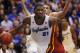 FILE - In this Jan. 29, 2014 file photo, Kansas center Joel Embiid (21) works around Iowa State forward Georges Niang, back, during the first half of an NCAA college basketball game in Lawrence, Kan. Embiid is a possible pick in the 2014 NBA Draft, Thursday, June 26, 2014 in New York.(AP Photo/Orlin Wagner, File)