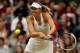 LONDON, ENGLAND - JUNE 28: Maria Sharapova of Russia hits a backhand return during her Ladies' Singles third round match against Alison Riske of the United States on day six of the Wimbledon Lawn Tennis Championships at the All England Lawn Tennis and Croquet Club at Wimbledon on June 28, 2014 in London, England. (Photo by Matthew Stockman/Getty Images)
