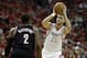 Apr 30, 2014; Houston, TX, USA; Houston Rockets forward Chandler Parsons (25) is defended by Portland Trail Blazers guard Wesley Matthews (2) during the second quarter in game five of the first round of the 2014 NBA Playoffs at Toyota Center. Mandatory Credit: Andrew Richardson-USA TODAY Sports