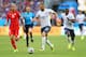 SALVADOR, BRAZIL - JUNE 20: Karim Benzema of France controls the ball as Valon Behrami of Switzerland gives chase during the 2014 FIFA World Cup Brazil Group E match between Switzerland and France at Arena Fonte Nova on June 20, 2014 in Salvador, Brazil. (Photo by Elsa/Getty Images)