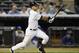 New York Yankees Derek Jeter hits an eighth-inning double in a baseball game against the Toronto Blue Jays at Yankee Stadium in New York, Wednesday, June 18, 2014. (AP Photo/Kathy Willens)