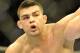 Kelvin Gastelum, left, lands a punch on Rick Story during a UFC 171 mixed martial arts welterweight bout, Saturday, March 15, 2014, in Dallas. Gastelum won by decision. (AP Photo/Matt Strasen)