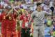 Belgium's goalkeeper Thibaut Courtois (1) and Belgium's Eden Hazard (10) wave to spectators following Belgium's 1-0 victory over Russia during the group H World Cup soccer match between Belgium and Russia at the Maracana Stadium in Rio de Janeiro, Brazil, Sunday, June 22, 2014. (AP Photo/Bernat Armangue)