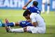 NATAL, BRAZIL - JUNE 24: Luis Suarez of Uruguay and Giorgio Chiellini of Italy react after a clash during the 2014 FIFA World Cup Brazil Group D match between Italy and Uruguay at Estadio das Dunas on June 24, 2014 in Natal, Brazil. (Photo by Matthias Hangst/Getty Images)