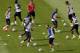 France's players run on the field during a training session at Santa Cruz stadium in Ribeirao Preto, Brazil, Saturday, June 28, 2014. France will face Nigeria on Monday in the round of 16 at the World Cup. (AP Photo/David Vincent)
