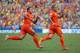 FORTALEZA, BRAZIL - JUNE 29: Wesley Sneijder of the Netherlands (R) celebrates scoring his team's first goal with Memphis Depay during the 2014 FIFA World Cup Brazil Round of 16 match between Netherlands and Mexico at Castelao on June 29, 2014 in Fortaleza, Brazil. (Photo by Dean Mouhtaropoulos/Getty Images)