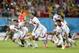 Costa Rica players react after Michael Umana scored during a shootout after regulation time in the World Cup round of 16 soccer match between Costa Rica and Greece at the Arena Pernambuco in Recife, Brazil, Sunday, June 29, 2014. Costa Rica defeated Greece 5-3 in penalty shootouts after a 1-1 tie. (AP Photo/Petr David Josek)
