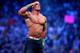 John Cena celebrates his win during Wrestlemania XXX at the Mercedes-Benz Super Dome in New Orleans on Sunday, April 6, 2014. (Jonathan Bachman/AP Images for WWE)