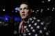 Chris Weidman, of Baldwin, N.Y., walks after defeating Anderson Silva, of Brazil, during the UFC 168 mixed martial arts middleweight championship bout on Saturday, Dec. 28, 2013, in Las Vegas. Weidman won during the second round by a technical knockout after Silva was injured. (AP Photo/David Becker)
