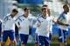Argentina's Lionel Messi, second left, jogs with teammates during a training session at Itaquerao Stadium in Sao Paulo, Brazil, Monday, June 30, 2014. On Tuesday, Argentina will face Switzerland in their next World Cup soccer match. (AP Photo/Victor R. Caivano)