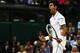 LONDON, ENGLAND - JUNE 30: Novak Djokovic of Serbia celebrates a point during his Gentlemen's Singles fourth round match against Jo-Wilfried Tsonga of France on day seven of the Wimbledon Lawn Tennis Championships at the All England Lawn Tennis and Croquet Club on June 30, 2014 in London, England. (Photo by Clive Brunskill/Getty Images)