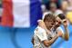 France's Antoine Griezmann, left, and Laurent Koscielny celebrate after Nigeria's Joseph Yobo scored an own goal during the World Cup round of 16 soccer match between France and Nigeria at the Estadio Nacional in Brasilia, Brazil, Monday, June 30, 2014. (AP Photo/Martin Meissner)