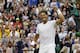 Rafael Nadal of Spain celebrates defeating Mikhail Kukushkin of Kazakhstan in their men's singles match at the All England Lawn Tennis Championships in Wimbledon, London, Saturday, June 28, 2014. (AP Photo/Ben Curtis)