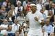 Rafael Nadal of Spain reacts after winning a point against Mikhail Kukushkin of Kazakhstan during their men's singles match on Centre Court at the All England Lawn Tennis Championships in Wimbledon, London, Saturday, June 28, 2014. (AP Photo/Ben Curtis)