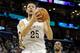 New Orleans Pelicans guard Austin Rivers (25) drives to the hoop against the Memphis Grizzlies in the second half of an NBA basketball game in New Orleans, Wednesday, March 12, 2014. The Grizzlies won 90-88. (AP Photo/Scott Threlkeld)