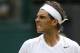 Rafael Nadal of Spain celebrates a point during the men's singles match against Lukas Rosol of the Czech Republic at the All England Lawn Tennis Championships in Wimbledon, London, Thursday, June 26, 2014. (AP Photo/Pavel Golovkin)