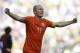 Netherlands' Arjen Robben celebrates after the World Cup round of 16 soccer match between the Netherlands and Mexico at the Arena Castelao in Fortaleza, Brazil, Sunday, June 29, 2014. The Netherlands won the match 2-1. (AP Photo/Natacha Pisarenko)