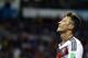 Germany's Mesut Ozil looks up during the World Cup round of 16 soccer match between Germany and Algeria at the Estadio Beira-Rio in Porto Alegre, Brazil, Monday, June 30, 2014. (AP Photo/Sergei Grits)
