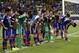 Japan's players salute fans after during the group C World Cup soccer match between Japan and Colombia at the Arena Pantanal in Cuiaba, Brazil, Tuesday, June 24, 2014. Colombia won 4-1.(AP Photo/Dolores Ochoa)