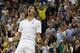 Novak Djokovic of Serbia celebrates defeating Jo-Wilfried Tsonga of France in their men's singles match at the All England Lawn Tennis Championships in Wimbledon, London, Monday, June 30, 2014. (AP Photo/Pavel Golovkin)