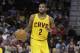 Cleveland Cavaliers' Kyrie Irving brings the ball downcourt during an NBA basketball game against the Brooklyn Nets Wednesday, April 16, 2014, in Cleveland. (AP Photo/Tony Dejak)