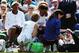 LONDON, ENGLAND - JULY 01: Serena Williams of the United States recieves treatment during the warm up before their Ladies Doubles second round match with Venus Williams (l) against Kristina Barrois of Germany and Stefanie Voegele of Switzerland on day eight of the Wimbledon Lawn Tennis Championships at the All England Lawn Tennis and Croquet Club on July 1, 2014 in London, England. (Photo by Jan Kruger/Getty Images)