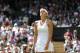Maria Sharapova of Russia looks up after losing a point to Angelique Kerber of Germany during their women's singles match at the All England Lawn Tennis Championships in Wimbledon, London, Tuesday, July 1, 2014. (AP Photo/Ben Curtis)