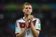 PORTO ALEGRE, BRAZIL - JUNE 30: Per Mertesacker of Germany acknowledges the fans after defeating Algeria 2-1 during the 2014 FIFA World Cup Brazil Round of 16 match between Germany and Algeria at Estadio Beira-Rio on June 30, 2014 in Porto Alegre, Brazil. (Photo by Matthias Hangst/Getty Images)