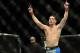 Dec 28, 2013; Las Vegas, NV, USA; Chris Weidman reacts in the cage after defeating Anderson Silva (not pictured) in their UFC middleweight championship bout at the MGM Grand Garden Arena. Mandatory Credit: Jayne Kamin-Oncea-USA TODAY Sports