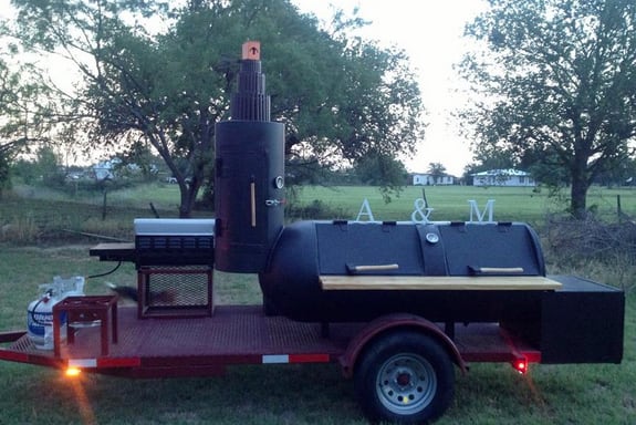 Photos: Texas A&M Fan's BBQ Smoker, Tailgate Setup Puts All Others To Shame