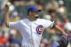 Chicago Cubs starting pitcher Jason Hammel delivers a pitch during the first inning of a baseball game against the Washington Nationals in Chicago, Friday, June 27, 2014. (AP Photo/Paul Beaty)