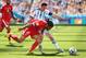 SAO PAULO, BRAZIL - JULY 01: Ricardo Rodriguez of Switzerland challenges Lionel Messi of Argentina during the 2014 FIFA World Cup Brazil Round of 16 match between Argentina and Switzerland at Arena de Sao Paulo on July 1, 2014 in Sao Paulo, Brazil. (Photo by Jamie Squire/Getty Images)