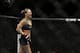 Ronda Rousey reacts after defeating Sara McMann following a UFC 170 mixed martial arts women's bantamweight title fight on Saturday, Feb. 22, 2014, in Las Vegas. (AP Photo/Isaac Brekken)