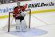 New Jersey Devils goalie Martin Brodeur stands in goal late in the third period of an NHL hockey game against the Boston Bruins in Newark, N.J., Sunday, April 13, 2014. The Devils won 3-2. (AP Photo/Mel Evans)