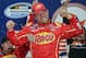 Regan Smith celebrates in Victory Lane after winning the NASCAR Nationwide series auto race at Daytona International Speedway in Daytona Beach, Fla., Saturday, Feb. 22, 2014. (AP Photo/Chuck Burton)