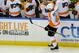 Philadelphia Flyers center Vincent Lecavalier (40) celebrates his goal against the New York Islanders with teammates in the first period of an NHL hockey game at the Nassau Coliseum on Saturday, Oct. 26, 2013, in Uniondale, N.Y. Lecavalier scored three goals during the Flyers 5-2 win. (AP Photo/Kathy Kmonicek)