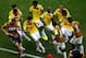 BRASILIA, BRAZIL - JUNE 19: James Rodriguez #10 of Colombia celebrates by dancing with teammates after scoring his team's first goal during the 2014 FIFA World Cup Brazil Group C match between Colombia and Cote D'Ivoire at Estadio Nacional on June 19, 2014 in Brasilia, Brazil. (Photo by Adam Pretty/Getty Images)