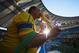 RIO DE JANEIRO, BRAZIL - JUNE 25: A fan kisses a replica of the World Cup trophy during the 2014 FIFA World Cup Brazil Group E match between Ecuador and France at Maracana on June 25, 2014 in Rio de Janeiro, Brazil. (Photo by Matthias Hangst/Getty Images)