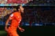 SAO PAULO, BRAZIL - JUNE 23: Memphis Depay of the Netherlands celebrates scoring his team's second goal during the 2014 FIFA World Cup Brazil Group B match between the Netherlands and Chile at Arena de Sao Paulo on June 23, 2014 in Sao Paulo, Brazil. (Photo by Dean Mouhtaropoulos/Getty Images)