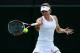 LONDON, ENGLAND - JULY 01: Simona Halep of Romania plays a forehand return during her Ladies' Singles fourth round match against Zarina Diyas of Kazakhstan on day eight of the Wimbledon Lawn Tennis Championships at the All England Lawn Tennis and Croquet Club on July 1, 2014 in London, England. (Photo by Matthew Stockman/Getty Images)
