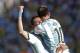 Argentina's Lionel Messi celebrates with Angel di Maria after di Maria scored his side's only and winning goal in extra time during the World Cup round of 16 soccer match between Argentina and Switzerland at the Itaquerao Stadium in Sao Paulo, Brazil, Tuesday, July 1, 2014. Argentina defeated Switzerland 1-0 to move on to the quarterfinals. (AP Photo/Manu Fernandez)