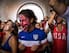 NEW YORK, NY - JULY 01: Christian Raja, of Brooklyn, reacts while watching the United States versus Belgium game in the World Cup on a projected screen under the Manhattan Bridge on July 1, 2014 in the Dumbo neighborhood of the Brooklyn borough of New York, United States. Belgium went on to eliminate the U.S. from the World Cup in overtime with a final score 2-1. (Photo by Andrew Burton/Getty Images)